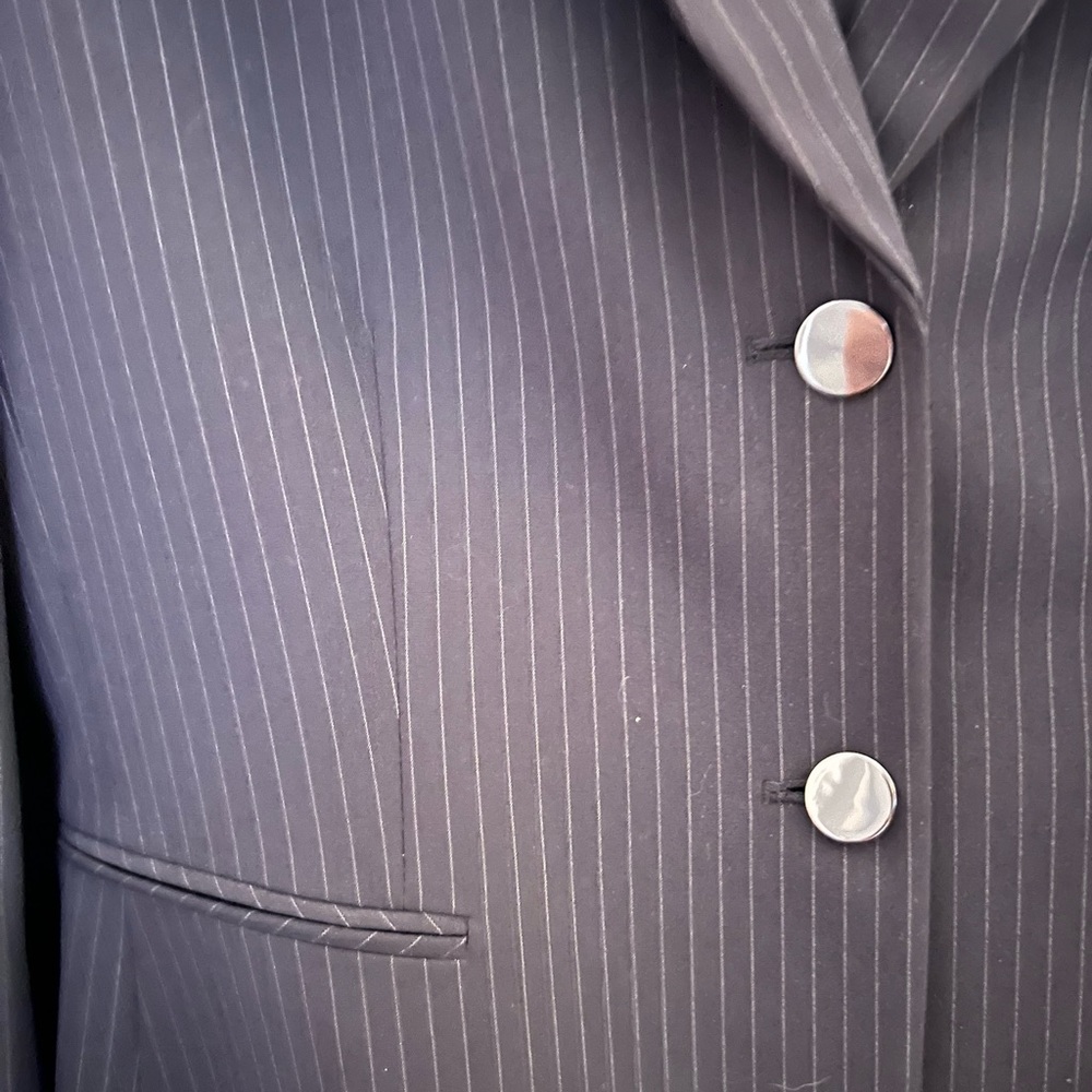 Navy blue pin stripe pant suit. Close up pics for actual colors, sizes in pics.